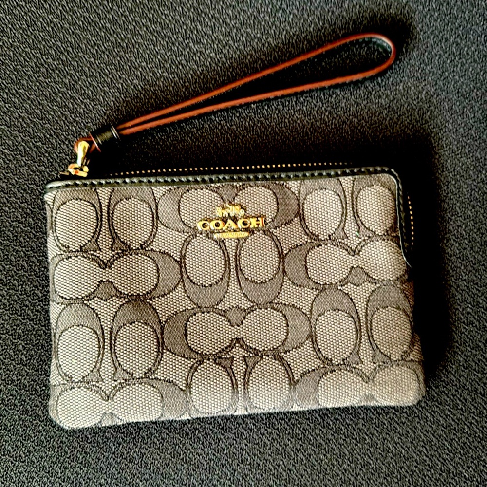 Coach canvas logo wristlet. New without tags.